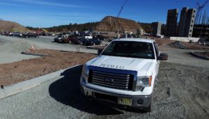Petillo pick-up truck in parking lot being developed.
