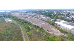 South facing aerial photo of the site excavation of the Fed Distribution Center.