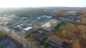 Western aerial perspective of the Hanover Crossroads shopping mall construction.