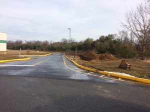 Paved entrance with curbs for Interstate Boulevard Phase 1 project.