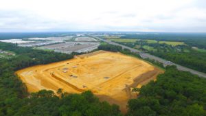 Aerial view of site clearing and of Interstate - Phase 2 project.